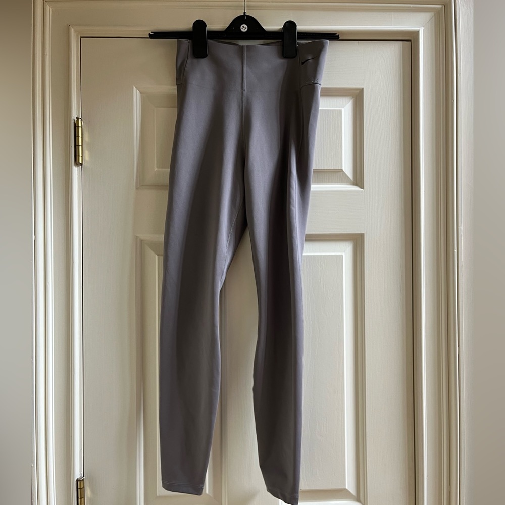 Greyish purple Nike leggings